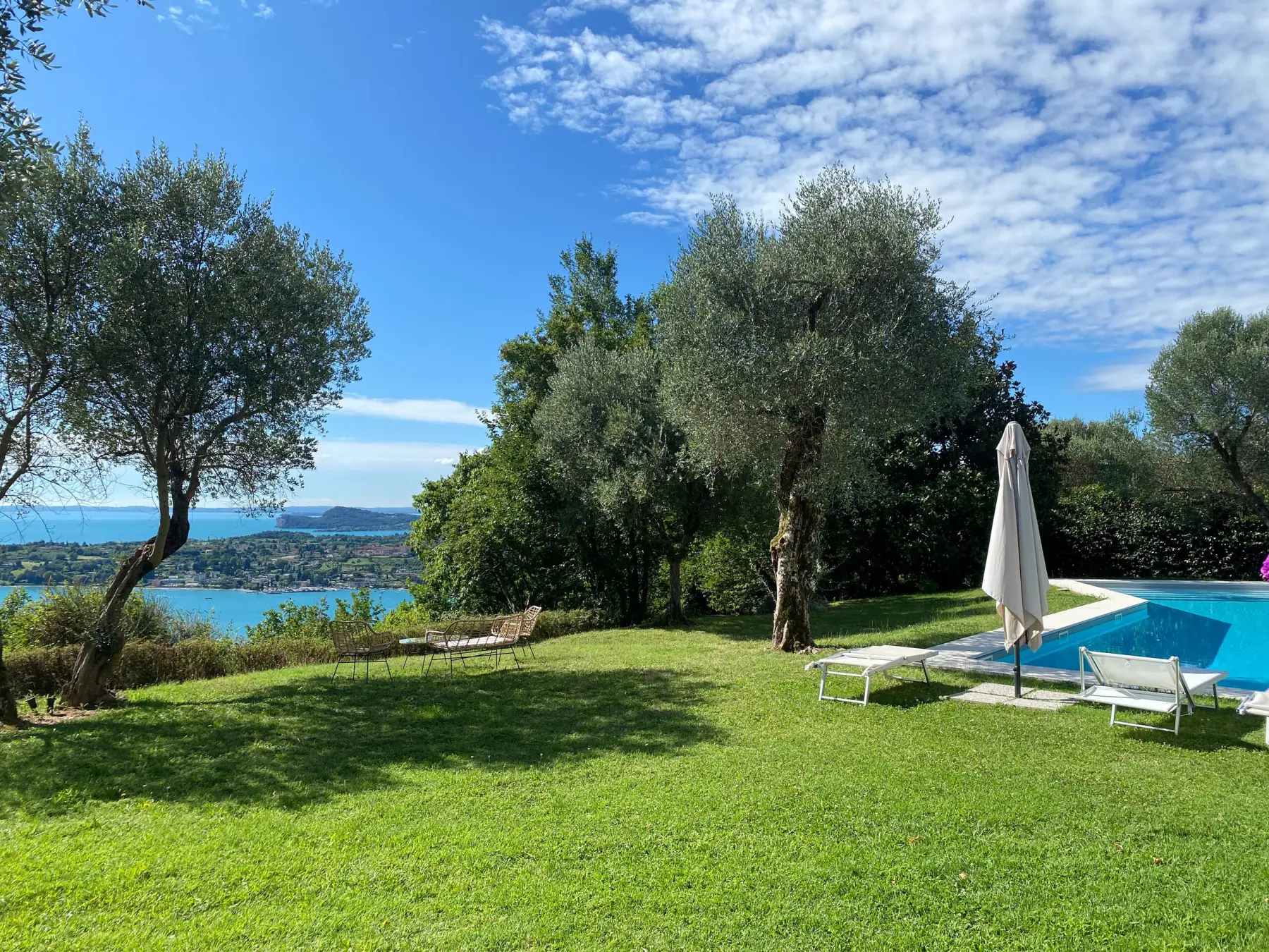 The garden, the pool and Lake Garda in one view